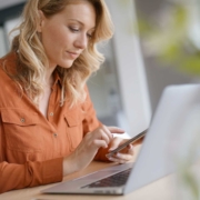 Knoxville Engineered Home Inspections woman checking ipad schedulign